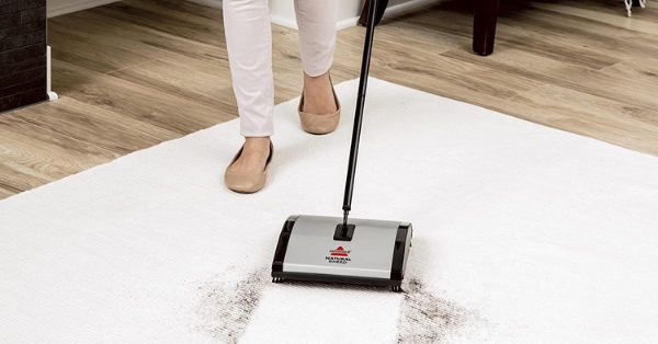 Mechanical carpet brush