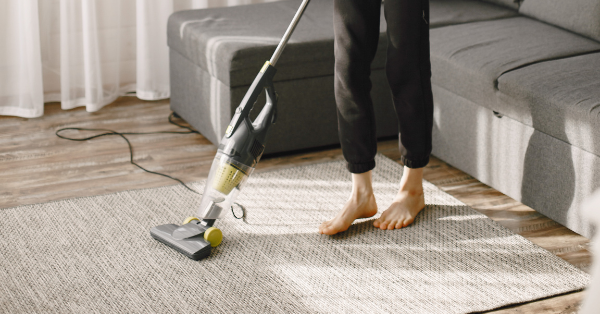 vacuuming the rug